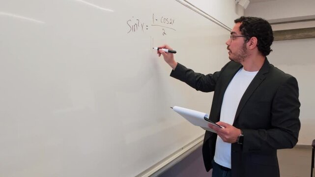 Man Visually Solving a Problem on a Board