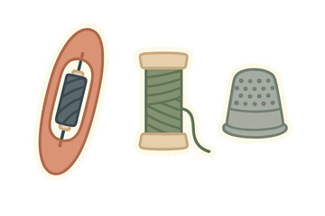 Essential sewing kit elements featuring a bobbin spool of thread and metal thimble