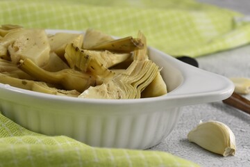 Artichokes in sunflower oil vinegar with garlic. Cynara cardunculus.