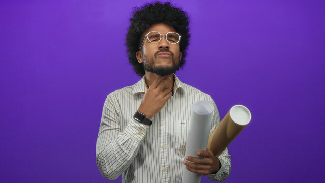 Man holding blueprints with an expression of discomfort on a purple background, wearing glasses and a smart watch, depicting an isolated architectural or design scenario.