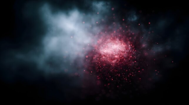 Vibrant red particles cluster within swirling dark smoke and mist creating an energetic abstract background