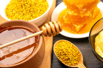 Honey and bee products displayed together in a rustic setting for culinary inspiration