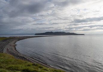 island, shore and rocks on the seashore in iceland