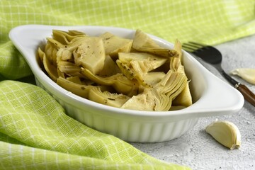 Artichokes in sunflower oil vinegar with garlic. Cynara cardunculus.