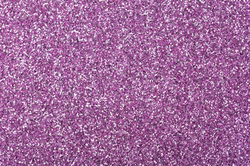 Glitter texture in exquisite violet tone, new background as part of your design work.