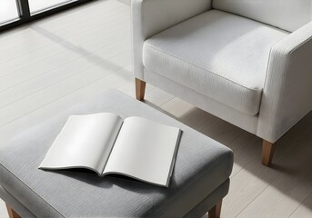 Blank magazine mockup on a fabric ottoman near an armchair, a sunlit corner of a modern living room