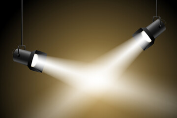 Spotlight beams illuminate the empty stage.
