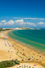 Vieste beach in Apulia with tourists relaxing on sand