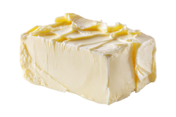 A close-up photo reveals a block of rich, yellow, soft butter, cut into a square shape