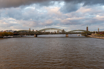 Fototapeta premium Hohenzollern Bridge Spanning the Rhine River in Cologne Cityscape
