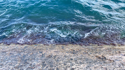 sea ​​wave and foam on the rocky shore