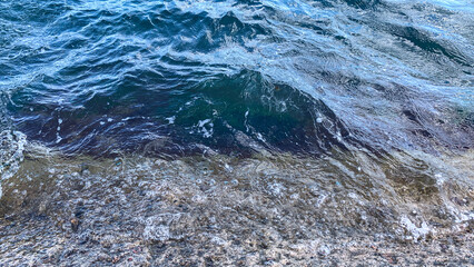 waves of the sea on the beach in the morning