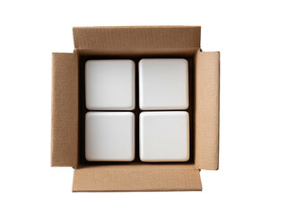 Overhead shot of a cardboard box filled with four white, evenly spaced, square containers
