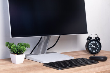 A computer on the desk. Neat and clean work desk.