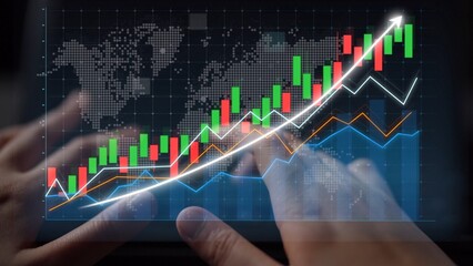 A close-up view of hands interacting with digital graphs illustrating stock market trends and financial data, showcasing growth through vibrant candlestick displays. Copula