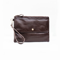 Blank brown leather pouch isolated on white background