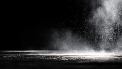 White powder rising from ground with dark background, dramatic lighting