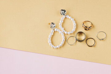 jewelry photography, flat lay, earrings, engagement ring, silver, gold, jewelry