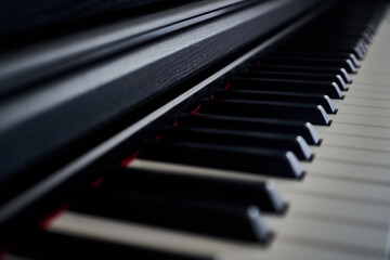 Close up of piano keyboard. Selective focus and shallow depth of field.