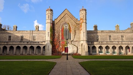 Fototapeta premium The University of Galway, quadrangle at sunset in Ireland, amazing architecture and landmark, medieval building 
