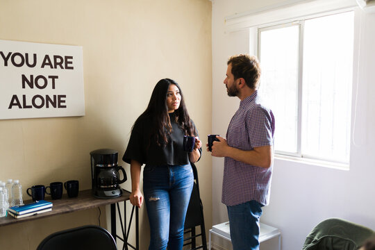 Two people talking during support group session