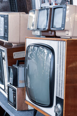 Many retro television. vintage old TV is colorful multi-row. Seeing the past. Pattern wall of old Antique television (TV). Television concept. Media.