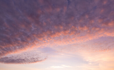 Fototapeta premium Clouds and sky backdrop at sunrise and sunset,Sunrise background. Dramatic majestic scenery sunset. Sky with clouds in Sunrise sky light background. Sunrise with clouds in various shapes.