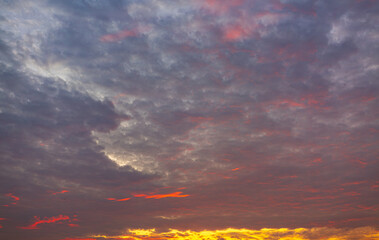 Clouds and sky backdrop at sunrise and sunset,Sunrise background. Dramatic majestic scenery sunset. Sky with clouds in Sunrise sky light background. Sunrise with clouds in various shapes.