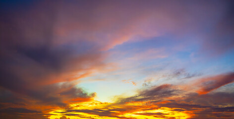 Fototapeta premium Clouds and sky backdrop at sunrise and sunset,Sunrise background. Dramatic majestic scenery sunset. Sky with clouds in Sunrise sky light background. Sunrise with clouds in various shapes.