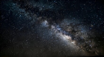 Fototapeta premium Milky Way Galaxy Shines Brightly in the Night Sky.
