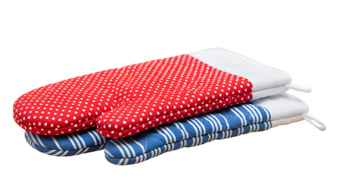 Two oven mitts with red polka dots and blue stripes isolated on transparent background
