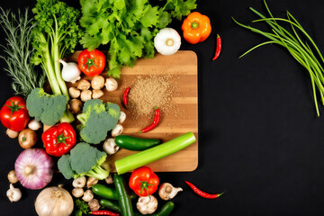 Fresh Vegetables Still Life: Broccoli, Peppers, Mushrooms, Herbs, and Spices on a Cutting Board - Healthy Eating, Cooking Ingredients