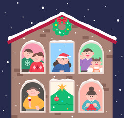 People looking out the window at the snowy Christmas landscape.