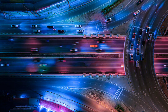 Fototapeta Expressway, Self-driving autonomous electric cars of the future with elements move along a busy traffic intersection. Artificial Intelligence, Car Scan, GPS Tracking, Smart Roads, IoT, highway
