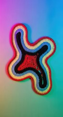 Fototapeta premium Colorful Crocheted Abstract Shape With Rainbow Edging and Black Center Unique Design Art