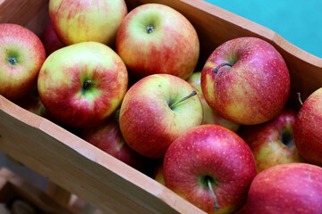 Fresh and appetizing apple presented at a an agricultural products fair. Selective focus. Photographed in natural light.