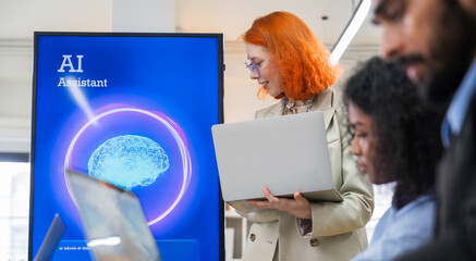 Multiethnic business and creative team collaborating meeting in modern office using AI assistant,...