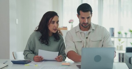 Young Latin couple male, female serious focus on laptop computer check document paper pay bills online plan budget expense in living room at home. Marriage money trouble, Family budget plan concept. - Powered by Adobe
