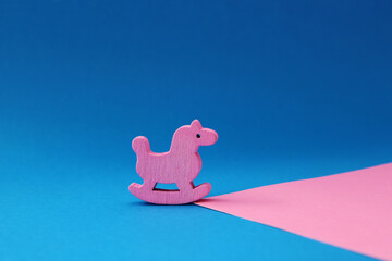 Pink wooden rocking horse, children's toys