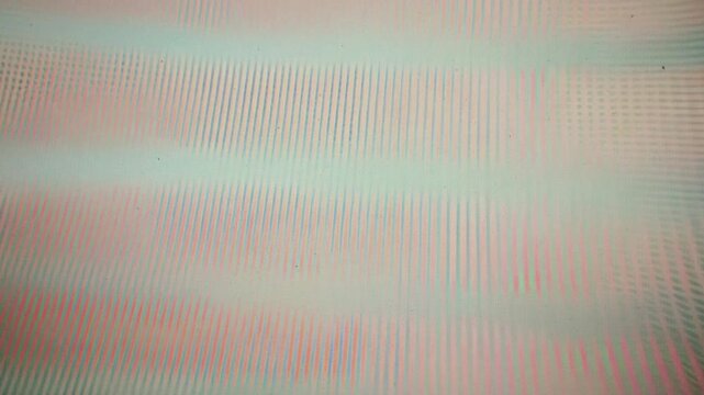 analog VHS video noise texture with horizontal lines and flickering distortion. The image shows a vintage television screen effect with static, interference, and scanlines.