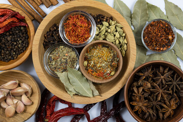 Assortment of spices in bowls. Top view.