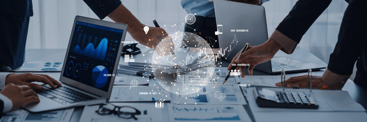 A dynamic business team collaborates in a modern workspace, utilizing technology and data visualization to enhance insights and drive strategic decisions. Trope