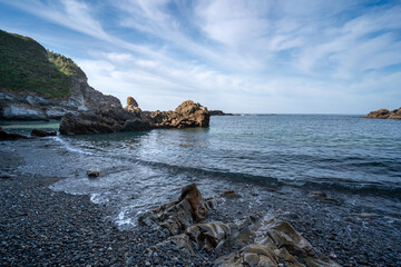 Pormenade beach seascape with a blue sky. Viavelez. Asturias. Spain