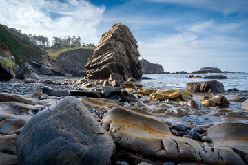 Pormenade beach seascape with a blue sky. Viavelez. Asturias. Spain
