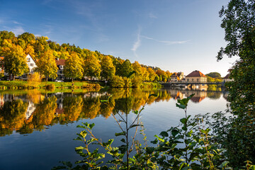 Beautiful waterfront at the autumnal Neckar River in T&uuml;bingen