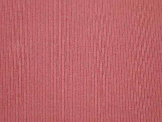 Pink  cotton knitted fabric, textile background, top view