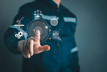 Inspector using digital interface to manage ISO standards, ensure compliance, monitor legal regulations, and maintain quality control in industrial or corporate environments.