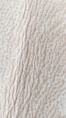 beige natural leather with visible details. background