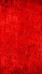 a board painted with red paint. background or textura