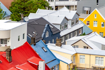 Close-up of assorted traditional colourful buildings and rooftops on a summer day, Reykjavik, Iceland